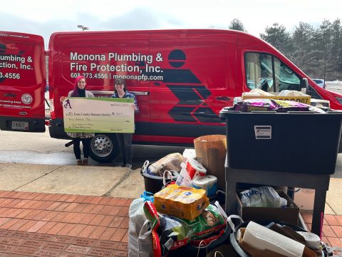 Monona Plumbing & Fire Protection service van with team and equipment.