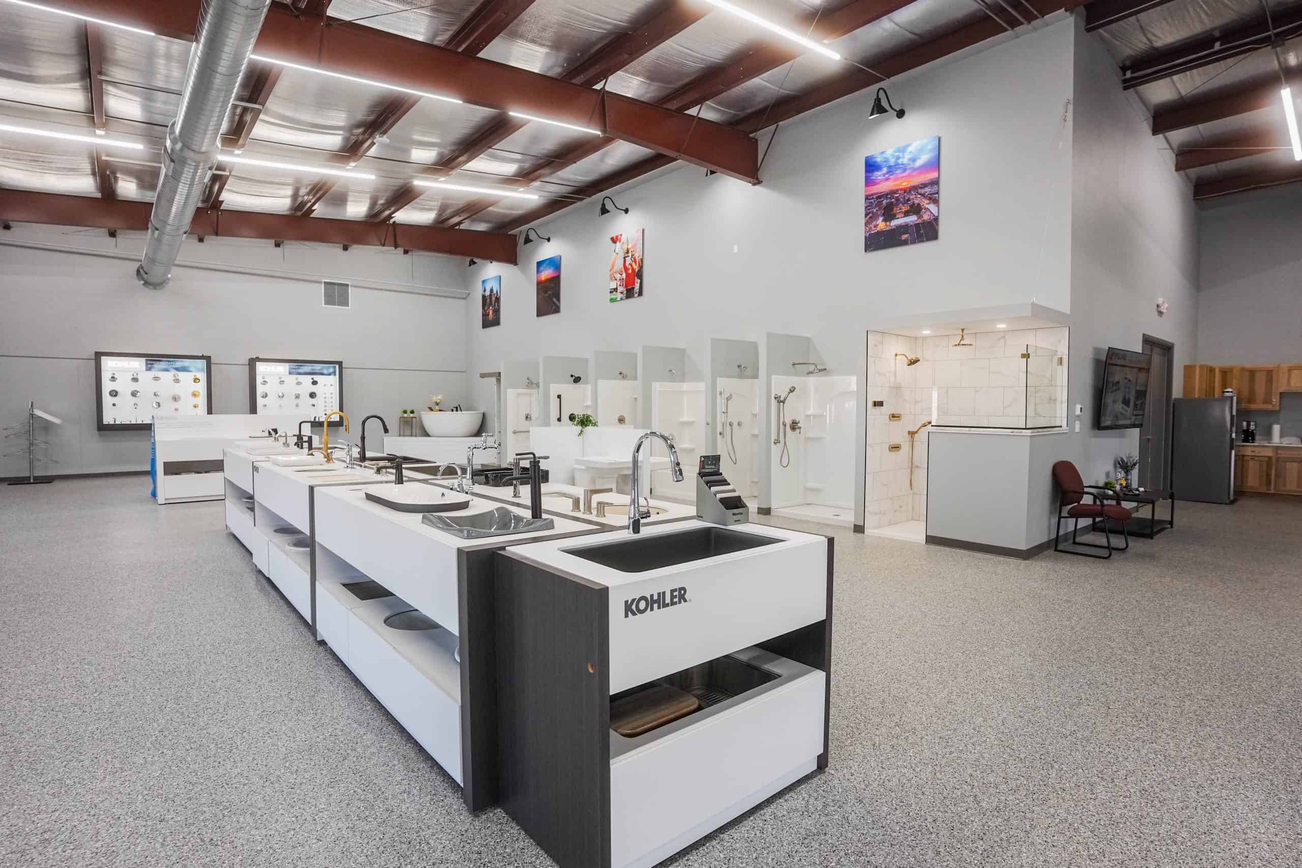 Indoor plumbing and HVAC showroom in Monona, Wisconsin with display models and equipment.