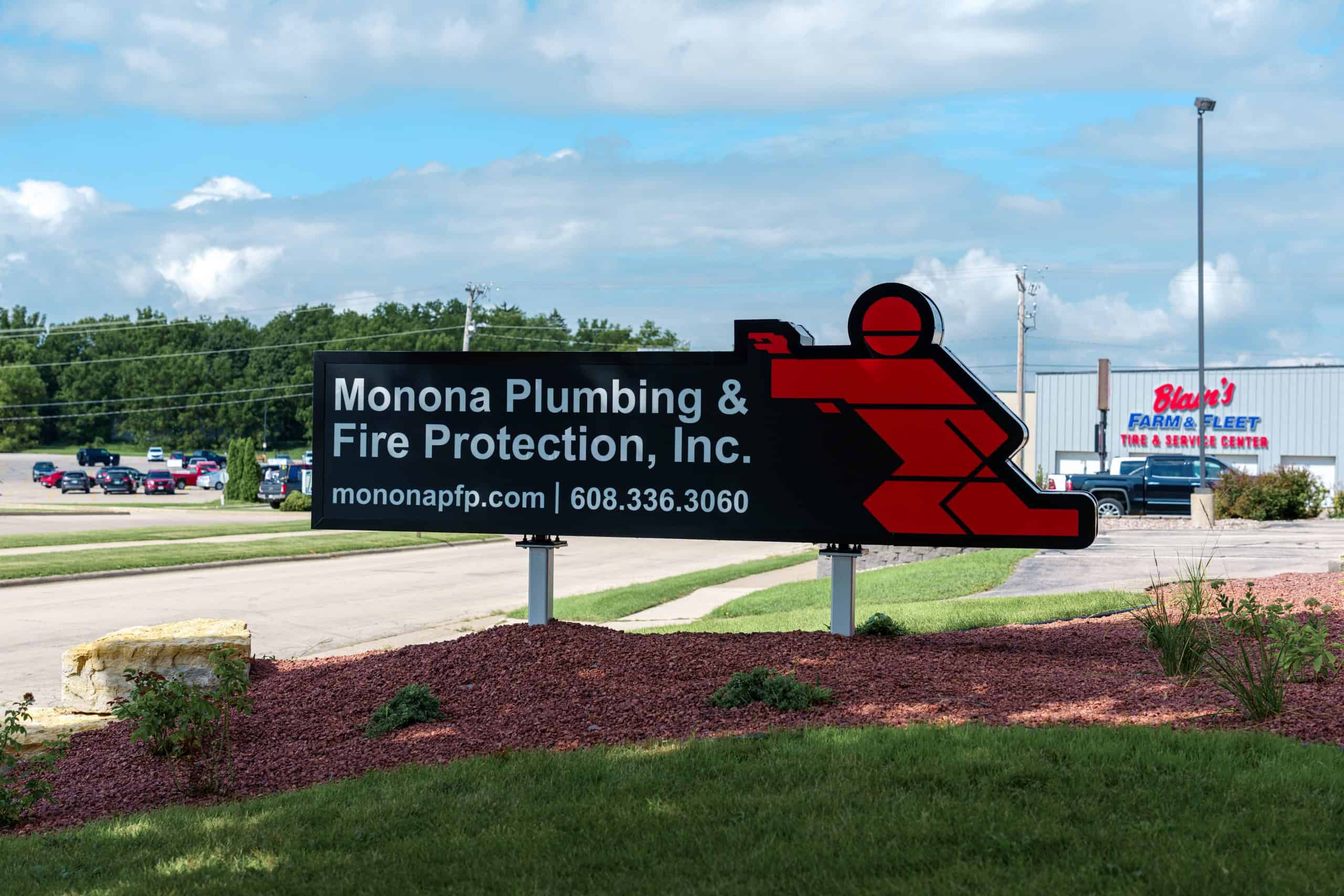 Sign for Monona Plumbing and Fire Protection in Monona, Wisconsin.