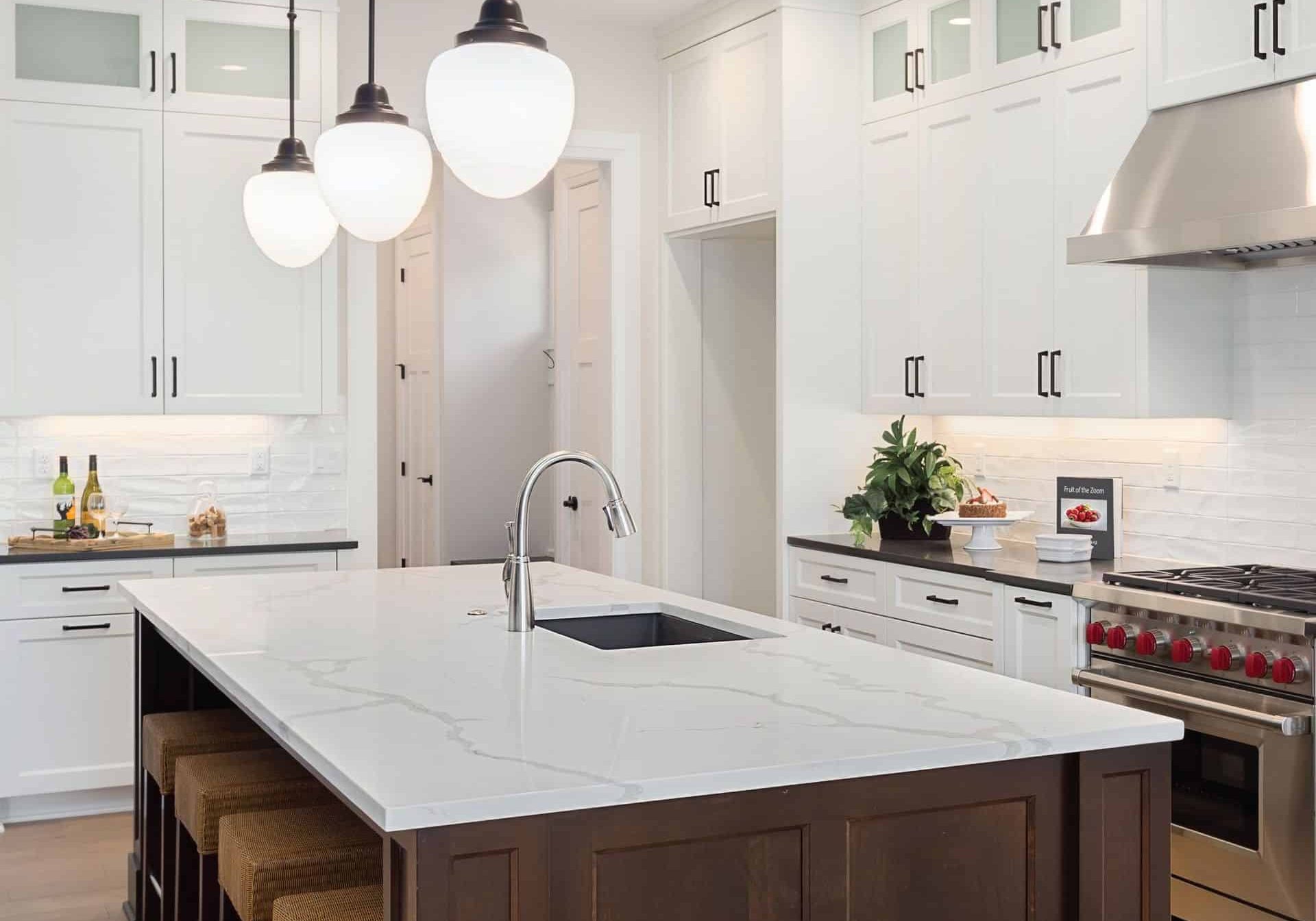 Modern kitchen featuring plumbing fixtures and fire protection equipment.