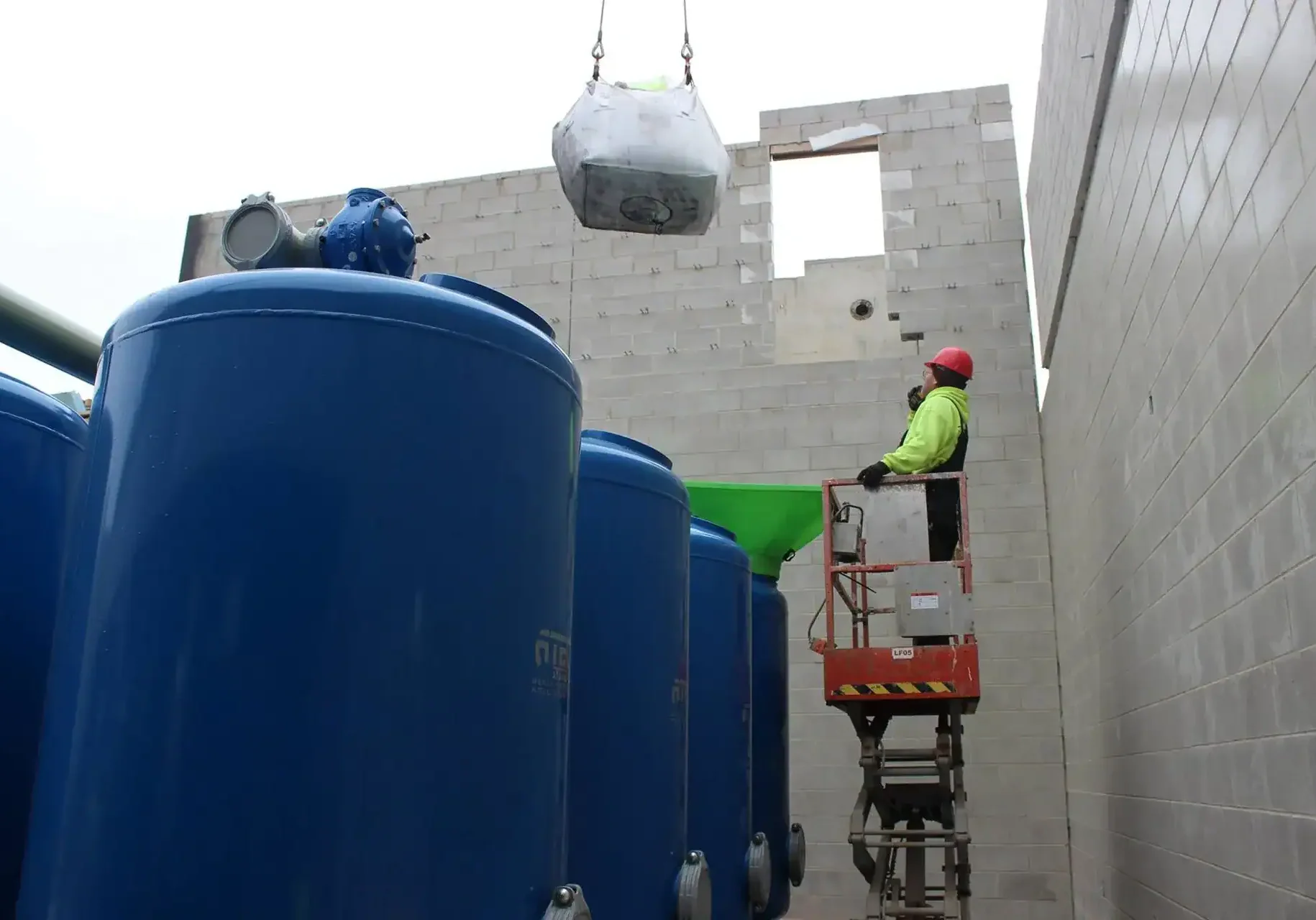 Installation of plumbing and fire protection systems at a construction site.